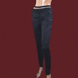 Black leopard print skinny leg mid rise trousers